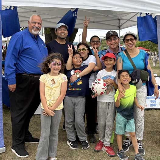 Community gathering during Christian radio events Canada with families and Lighthouse VOAR-FM team